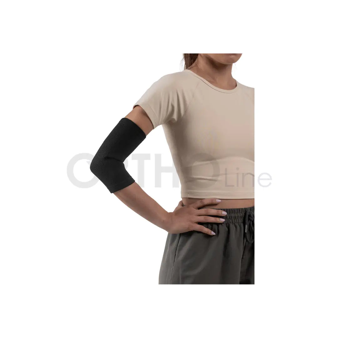 Cureline - women using Ortholine elbow support side view