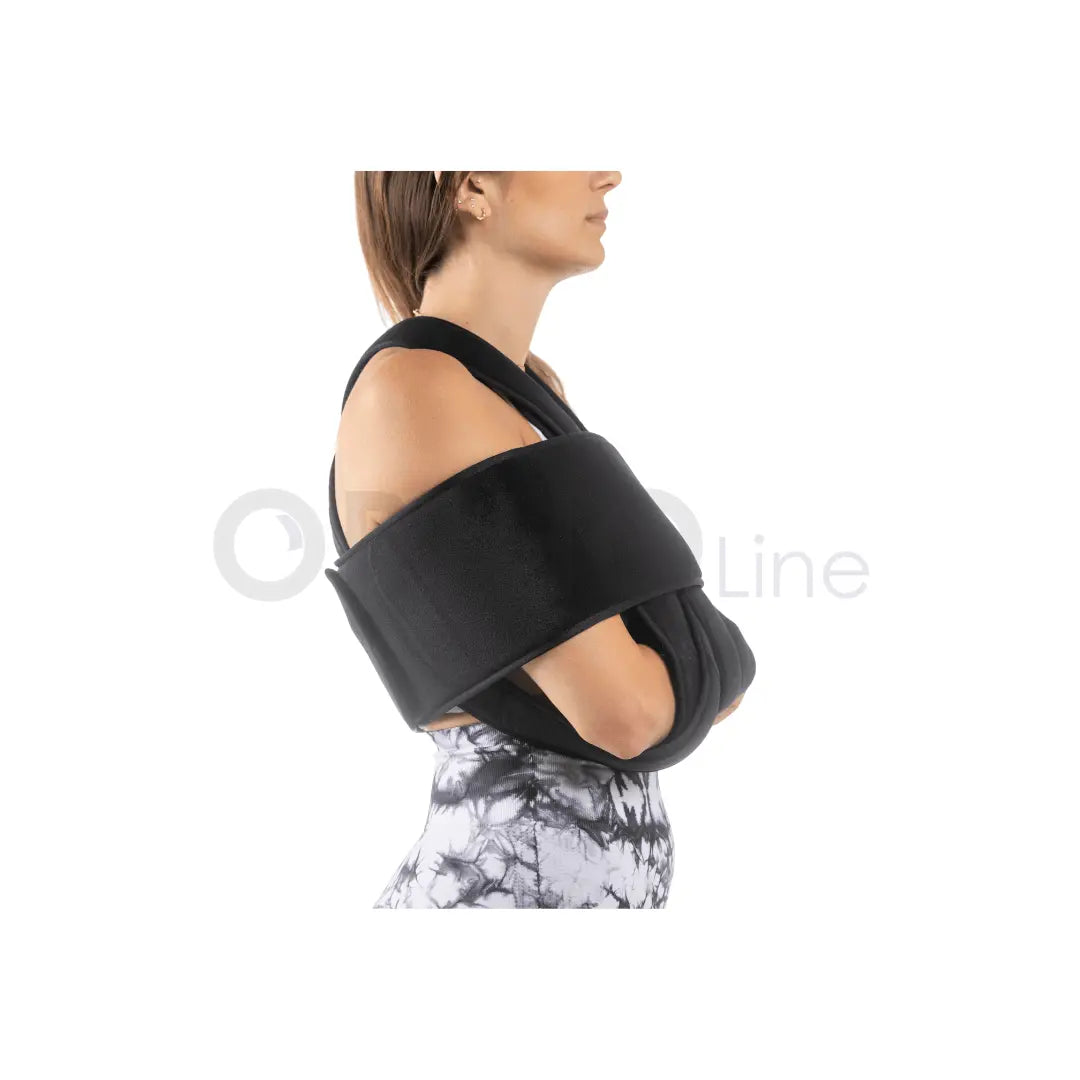 Cureline - women using Ortholine shoulder immobilizer back view