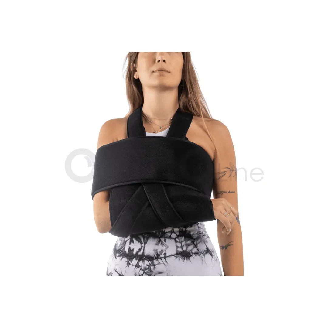 Cureline - women using Ortholine shoulder immobilizer front view