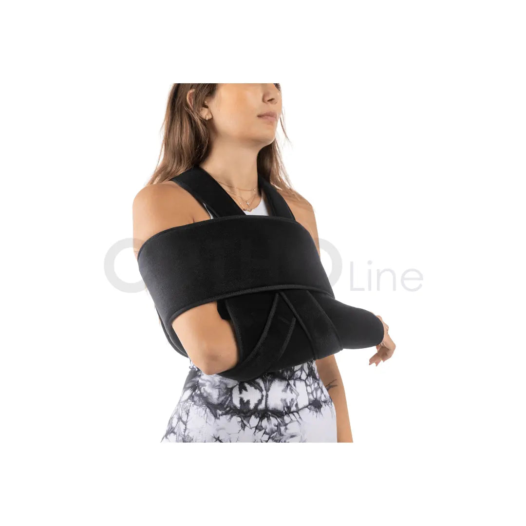 Cureline - women using Ortholine shoulder immobilizer side view