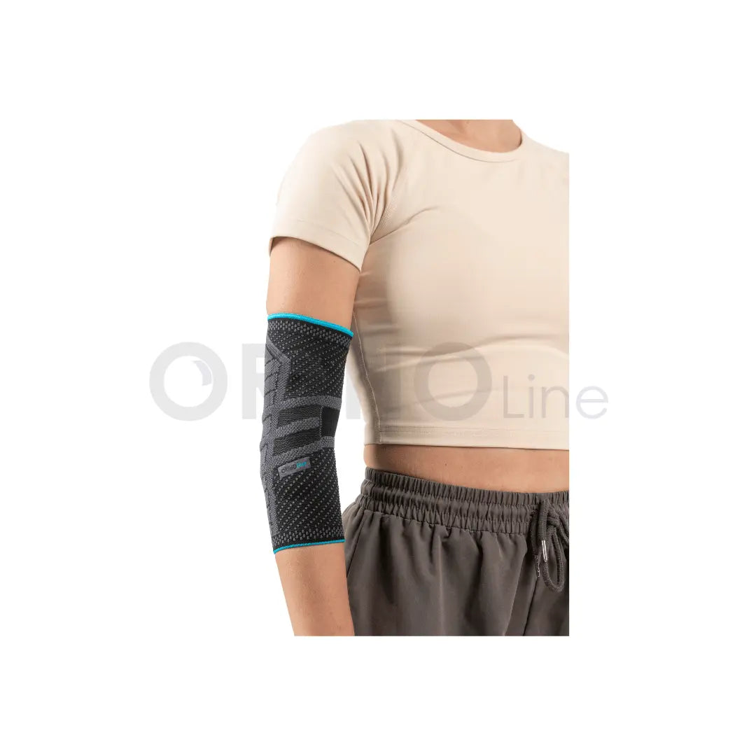 Cureline - women using Ortholine elbow brace