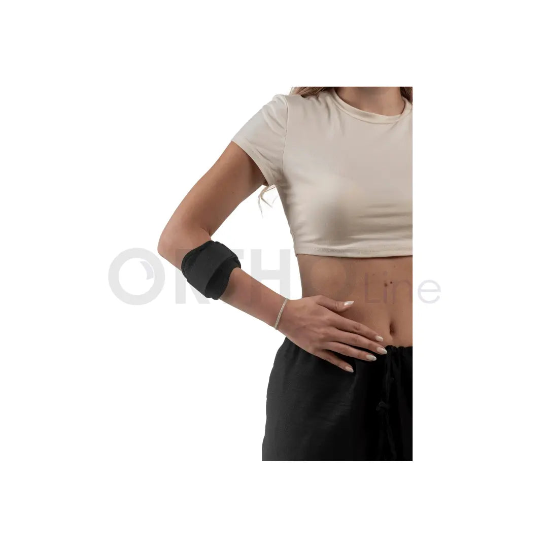 Cureline - women using Ortholine tennis brace side view