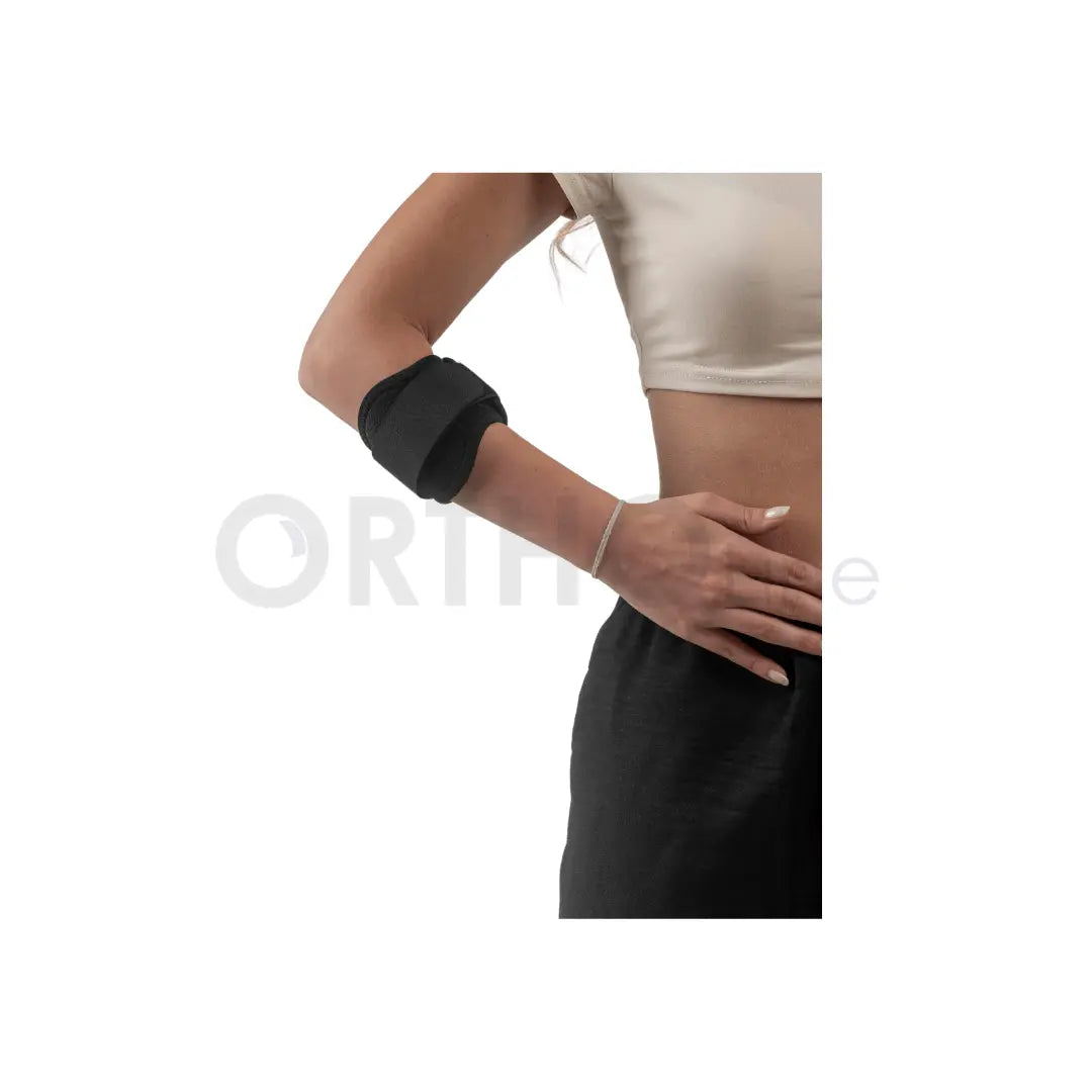 Cureline - women using Ortholine tennis brace zoom view